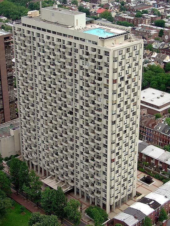Aerial view of Hopkinson House with rooftop pool and deck on level below.