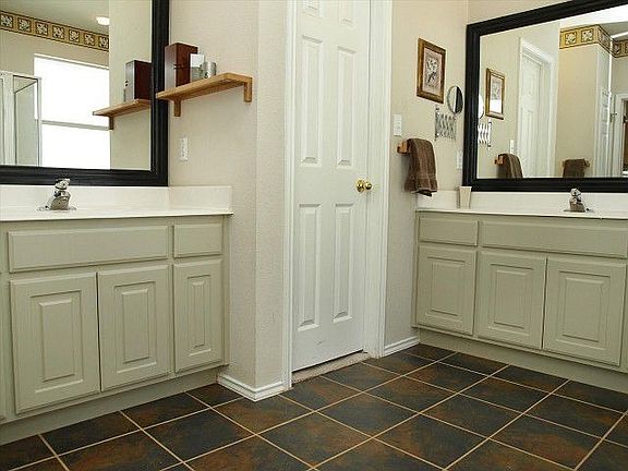 Framed Mirrors and Updated Plumbing Fixtures