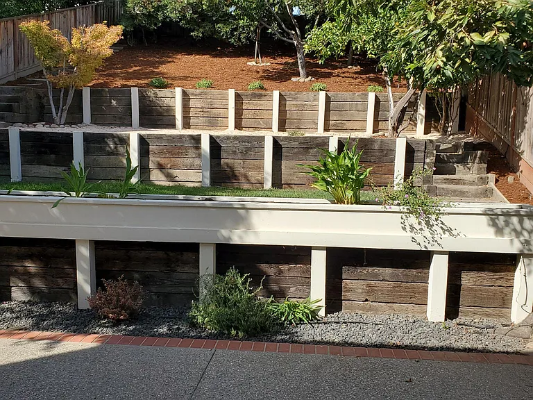 backyard patio looking up to 2nd, 3rd, and 4th level sections