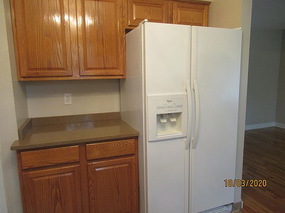 Kitchen with side-by-side Frig.