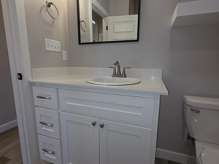 Main bath with floating shelves