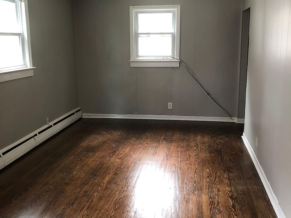 Living room. Newly painted, hardwood floors refinished.