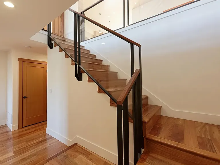 Stairs from main (2nd) level down to first level