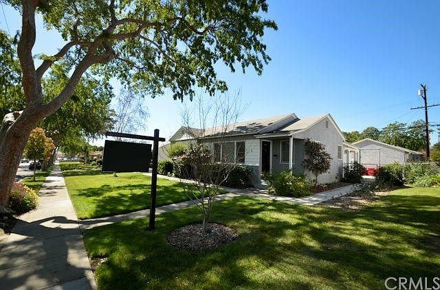Great curb appeal with tree lined street.