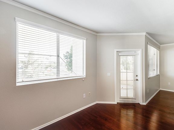 Livingroom with a door leading to the balcony