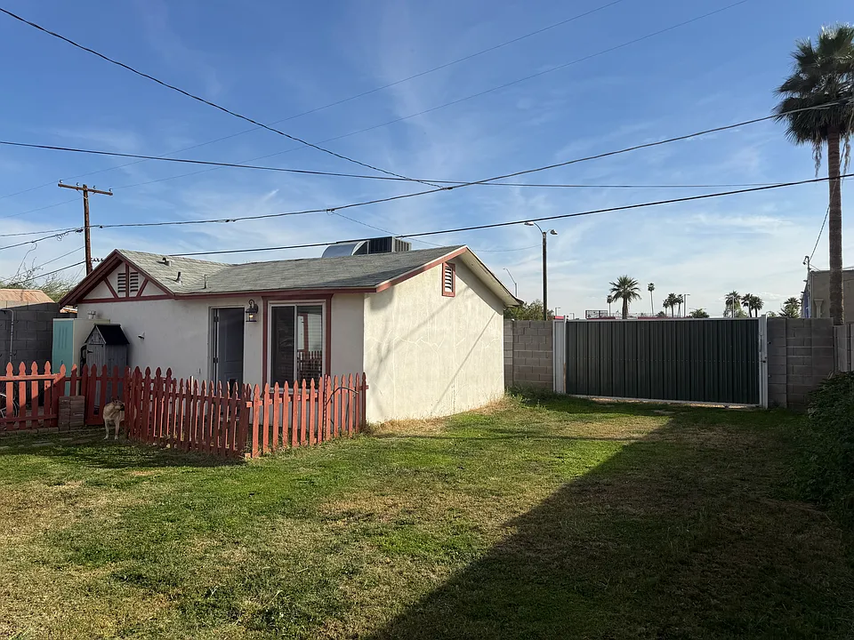 small pet door. fenced small yard and patio if want to keep small dog from roaming.