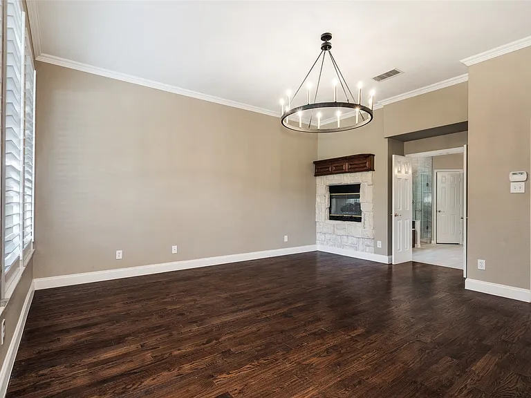 Fireplace in primary bedroom & bath.
