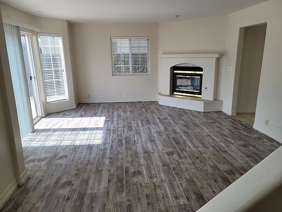 Living Room with Deck Access and Fireplace.