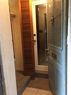 Double door entrance. Foyer has access to townhouse water and electric meters as well as tenant closet.