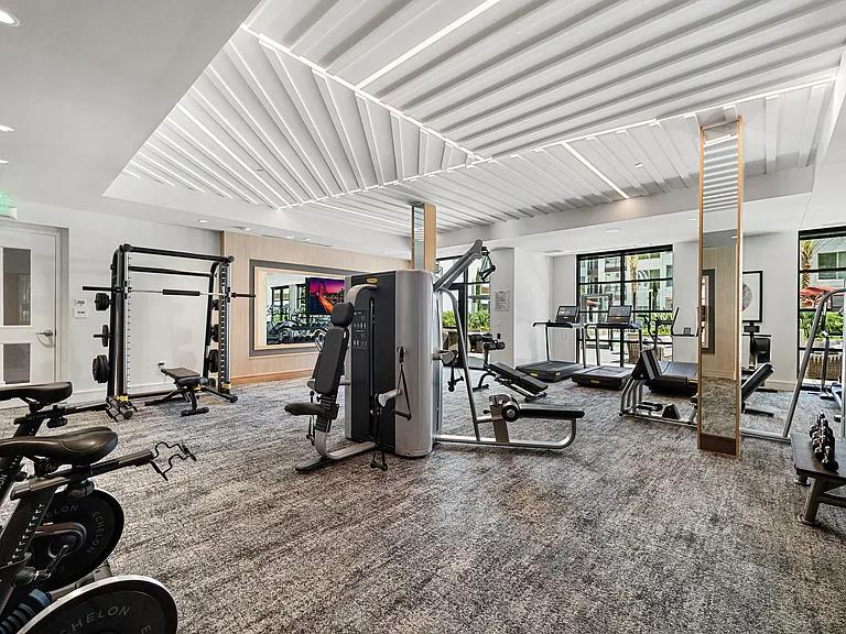 Fitness center with cardio machines, free weights, equipment
