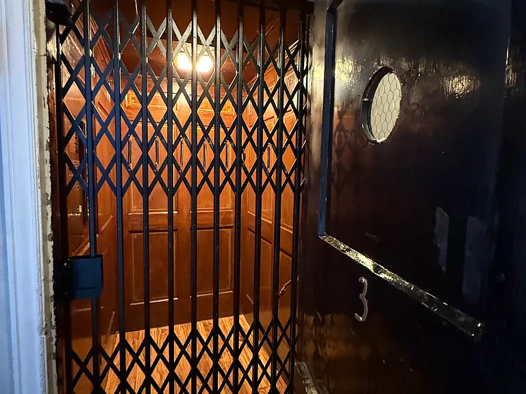 Beautiful mahogany wood well-maintained elevator. Two sets of stairways from lobby also available to your third floor condo.