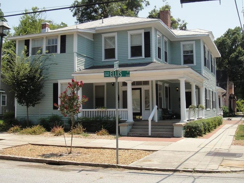 Unit is top half of house. Covered porch to left on bottom
