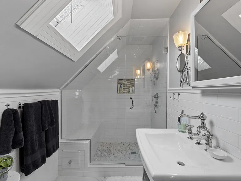 _ Bathroom
_ Standup shower
_ Skylight