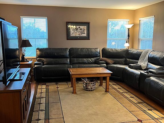Living room with lots of windows and light!