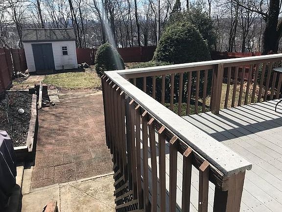 Private deck and patio. Shared grass yard. In winter, have view of the Boston Skyline.