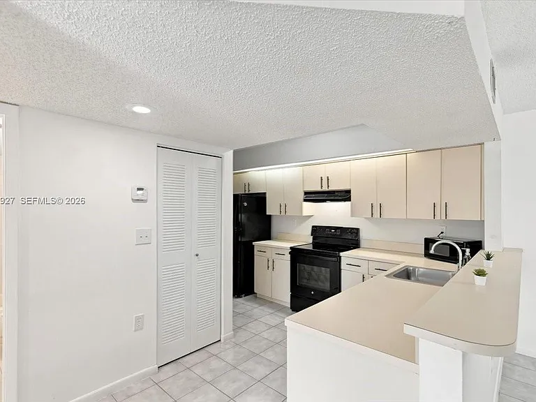 8660 SW 212th St #306 — Photo 8