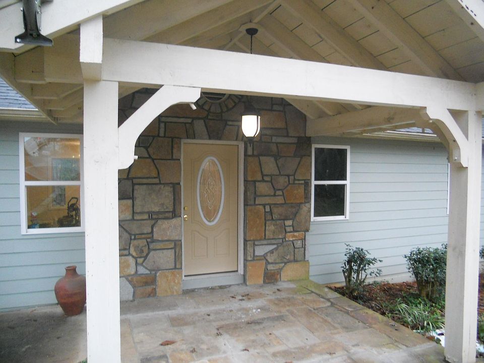 Timber frame stone front porch