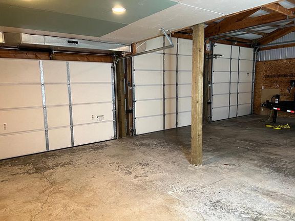 Oversized three-car garage with plenty of work space