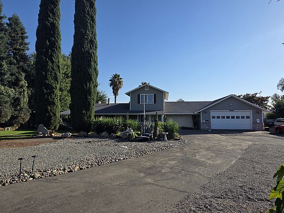 Front Shot of 29 Bob Way 5 Miles South of Oroville, Off HWY 99, within the Parking perimeter.
