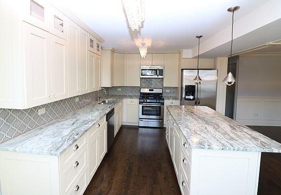 4th image of 3342 N Newland Ave