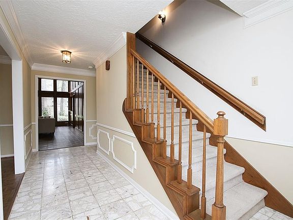Upon entering the foyer the formal dining room is to the left and you can see through to the den and back yard.