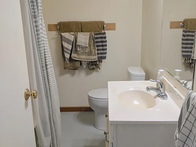 Bathroom has a clawfoot tub/ shower.