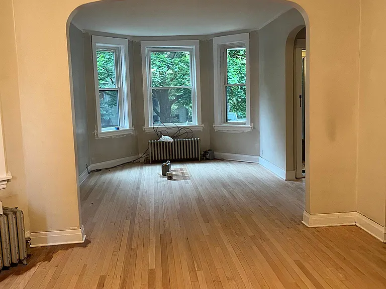 living room. Walls will be painted/refinished hardwood floors