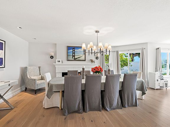 Jonathan Adler light fixture in dining room