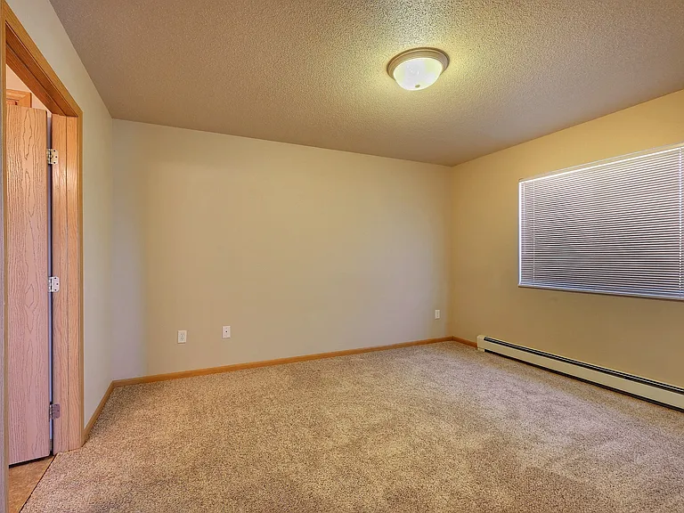Fargo, ND East Bridge Apartments | Bedroom