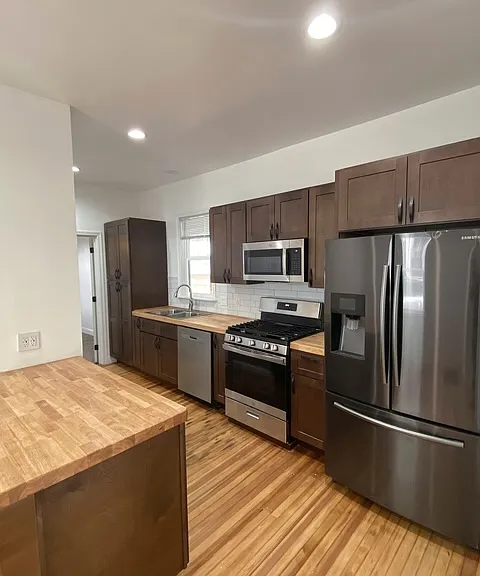 Recently renovated kitchen with stainless appliances