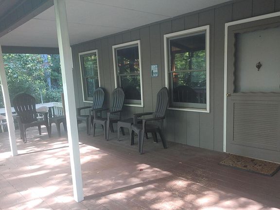 Enjoy cool mountain breezes on your large covered deck
