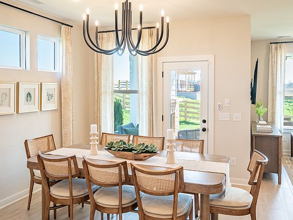 Dining area near kitchen with access to covered back patio