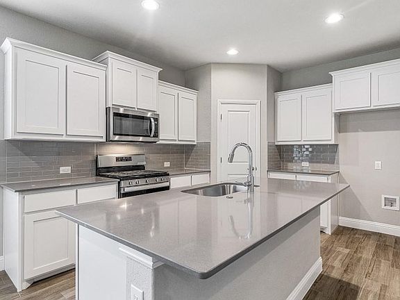 All Photos shown here may not depict the specified home & features included are for illustration purposes only