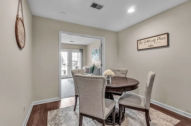 Spacious Dining with Wood Plank Floors