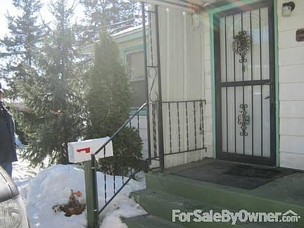 Front entrance. Covered entry way.