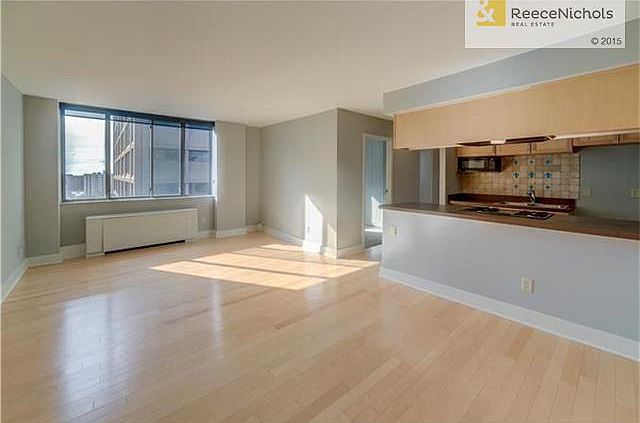 Living room dining room combo open to kitchen