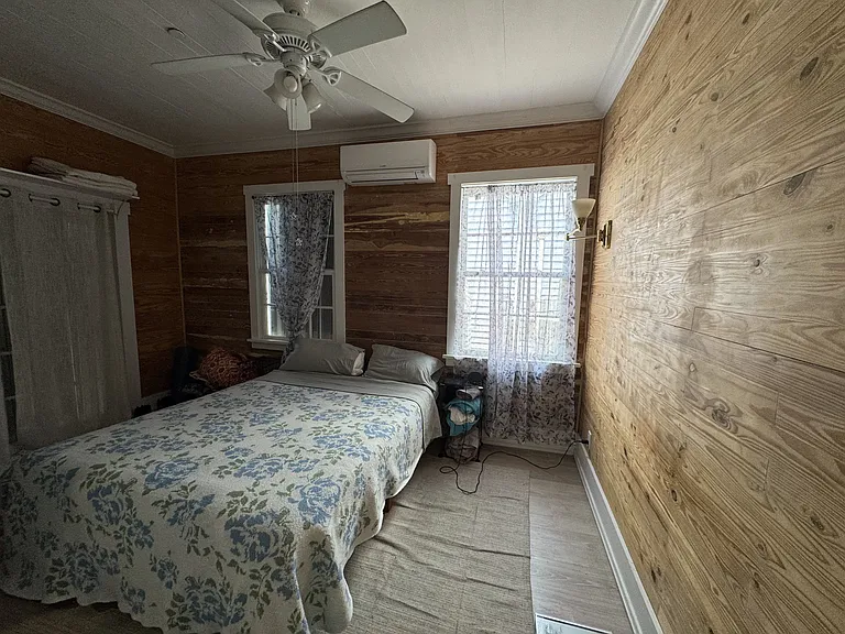 Main bedroom with beautiful dade county walls.