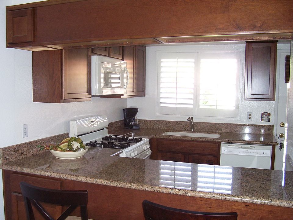 New Kitchen,Granite,Cherry Wood Cabinets, New Tile,