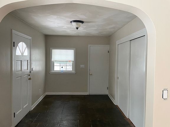 Foyer - left door main entrance, right door garage