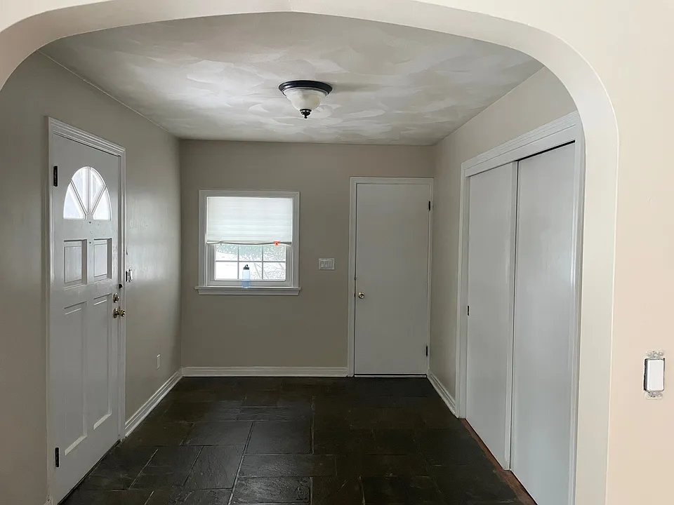 Foyer - left door main entrance, right door garage