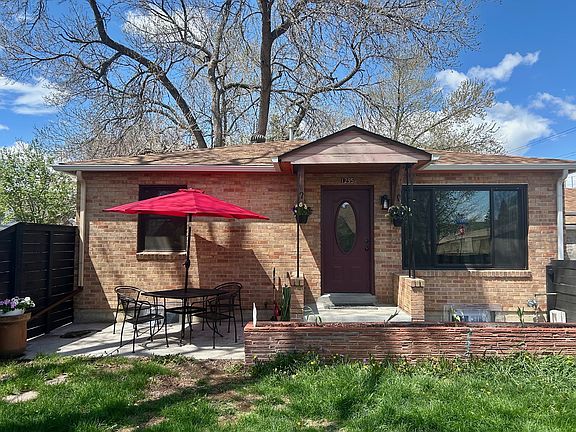 Patio set and umbrella included.