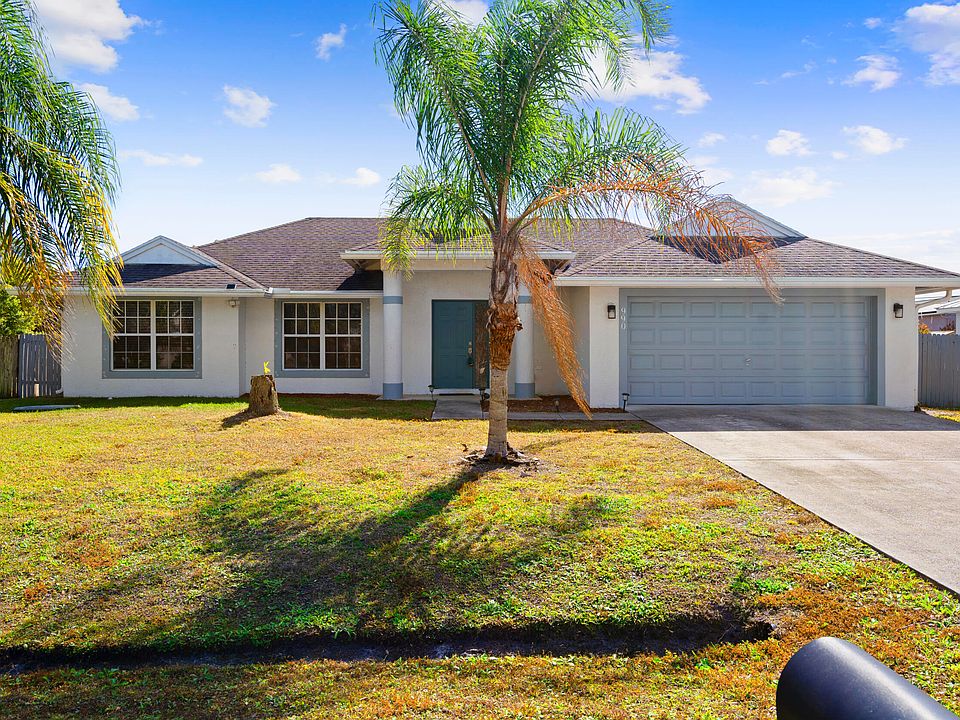 1st image of 990 SW Versailles Avenue