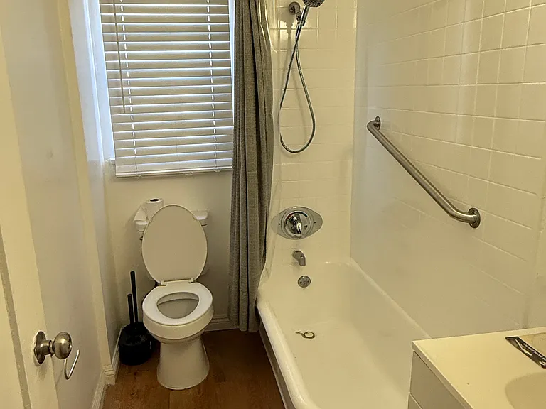 Bathroom with deep tub and shower