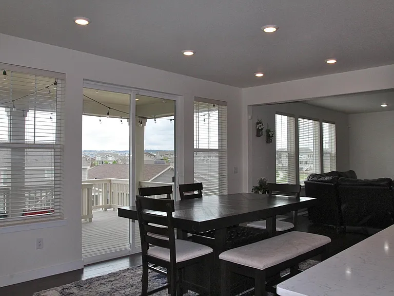 Dining room connects the kitchen to the covered patio
