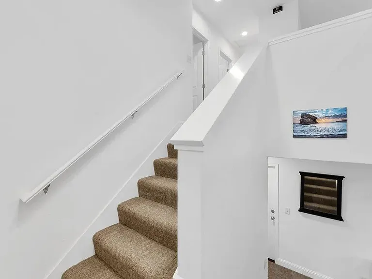 Stairs to bedrooms on 2nd floor