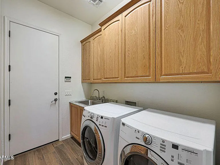 9773 S 183rd Dr — Photo 16