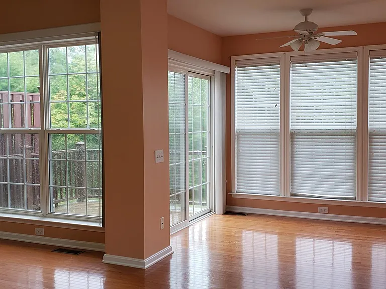 View of woods from Sunroom & Deck.