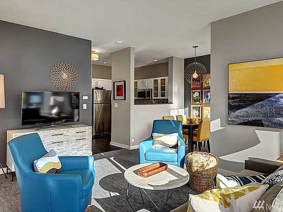 Designer paint colors and decor throughout this stunning updated 2 bedroom condo.  Unit is drenched in natural light with large windows and high ceilings. $40,000 in upgrades, Wow!