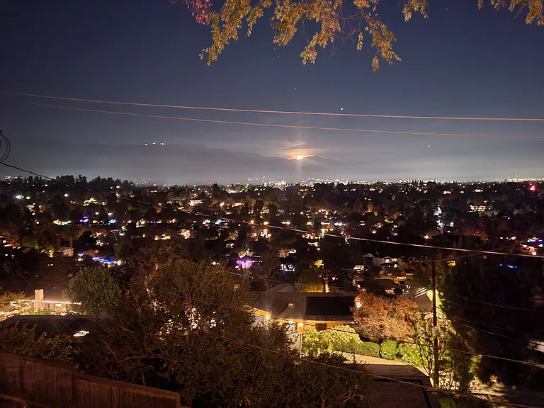 On select evenings, take in the breathtaking sight of the moon rising above the San Gabriel Mountains.