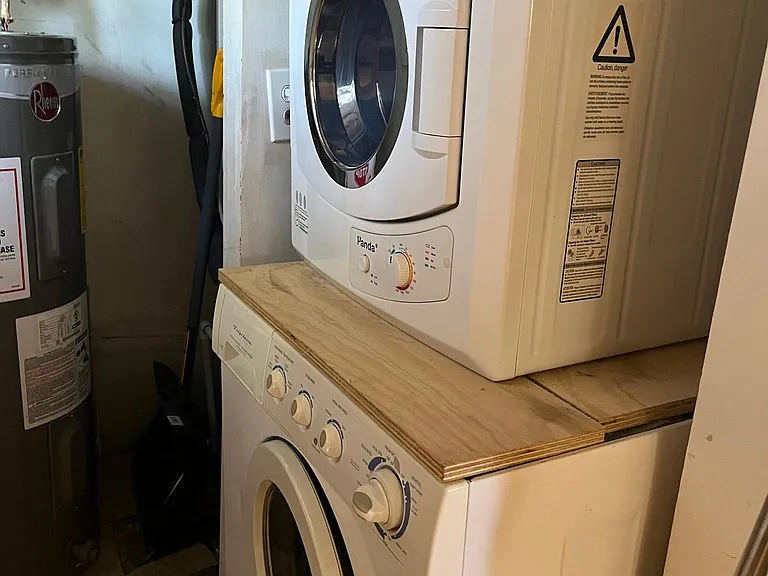 Utility closet with in unit washer and dryer